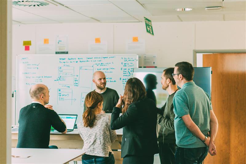 Image of Kyle running a workshop with the authentication team at Nationwide Building Society.
